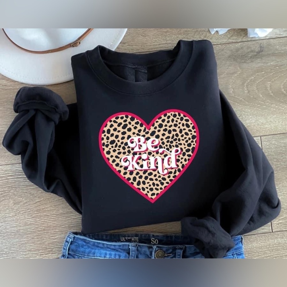 Be Kind Leopard Print Heart sweatshirt.